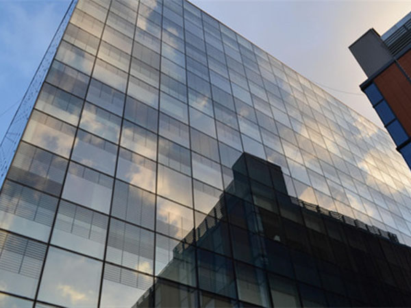 Structural Glass Solutions with Exposed Frame Curtain Wall Systems
